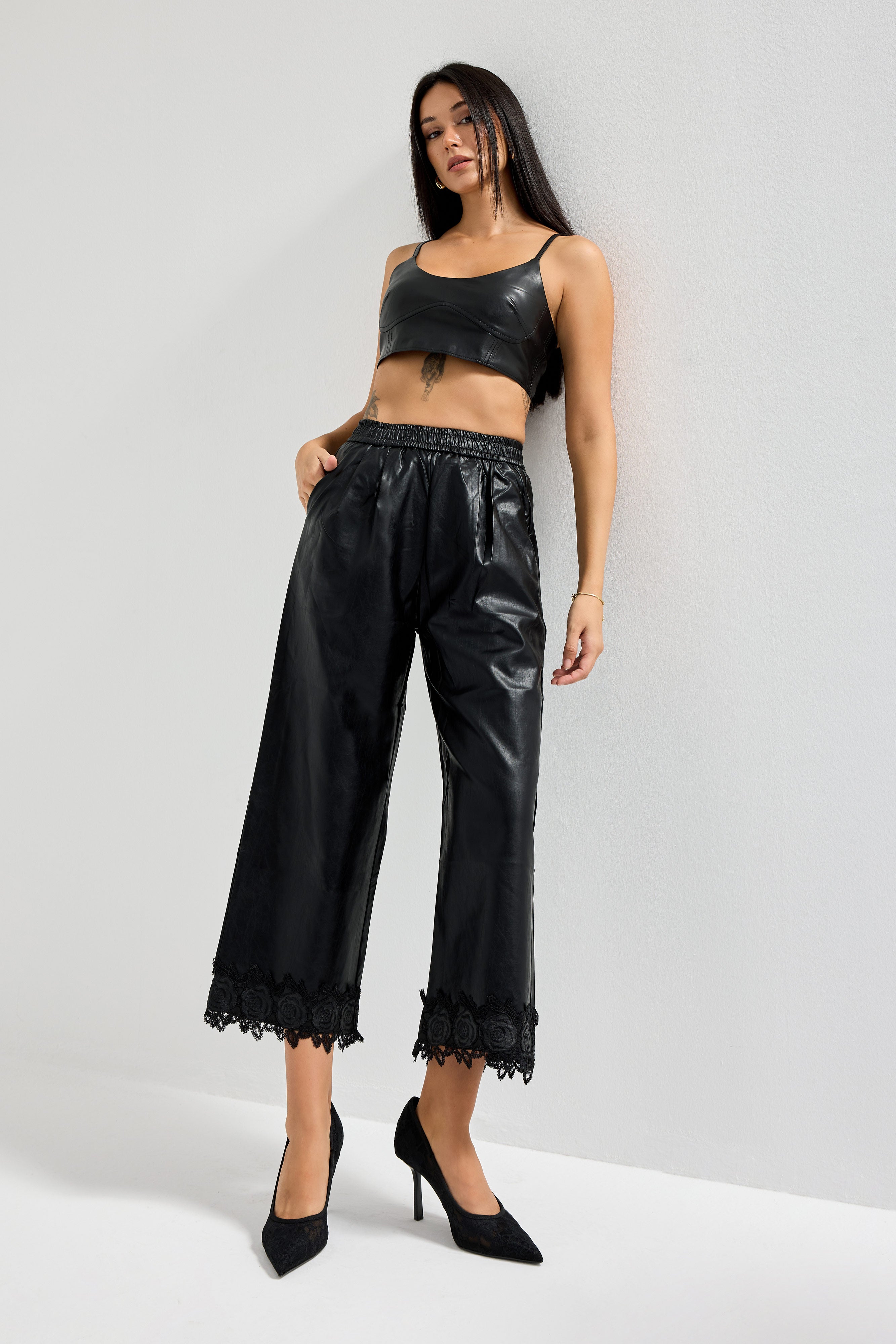 Women's Black Faux Leather Pants with Elastic Waist and Lace Trim Hems