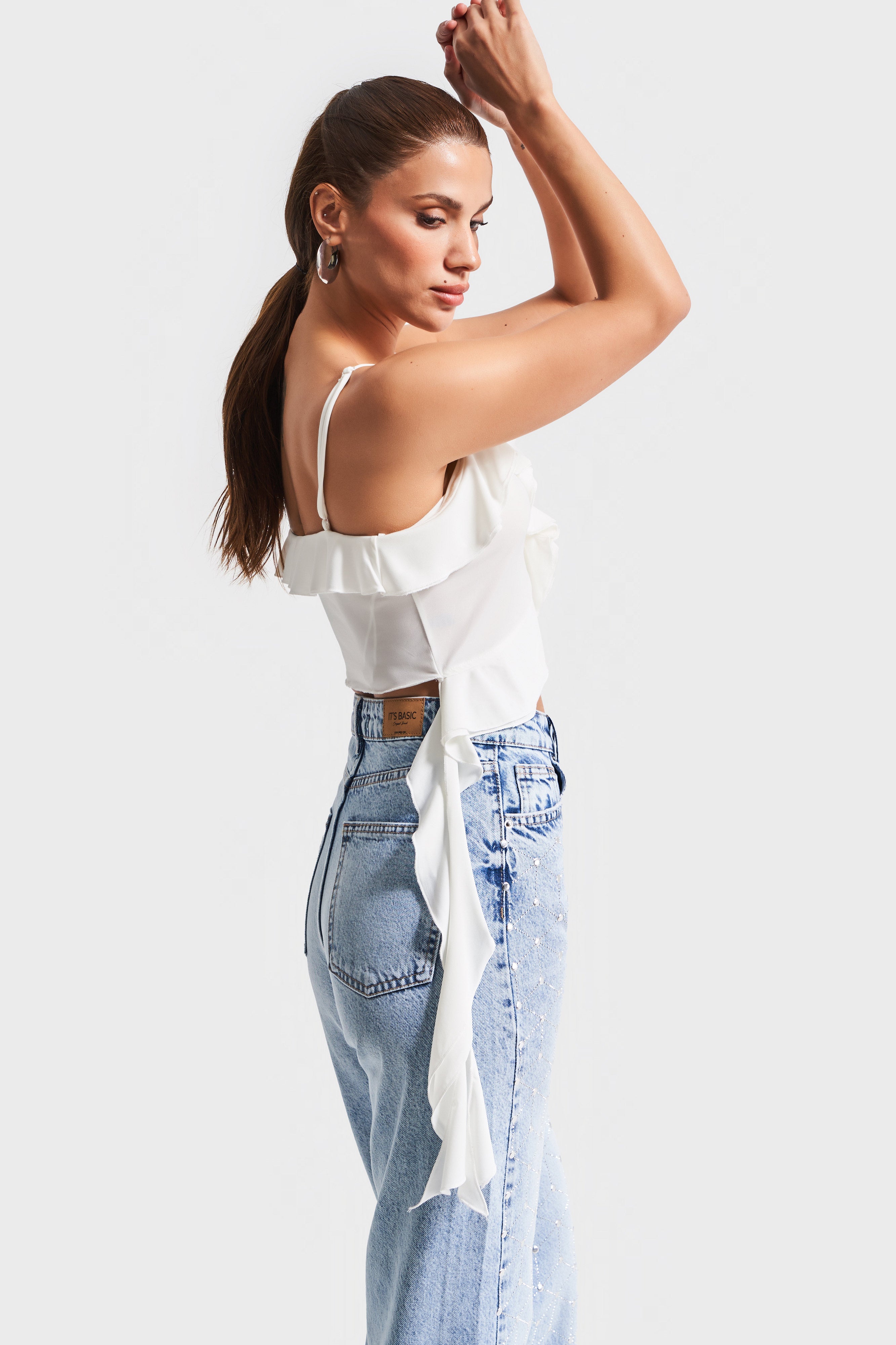 Женское бюстье цвета экрю с бретельками из эластичной ткани