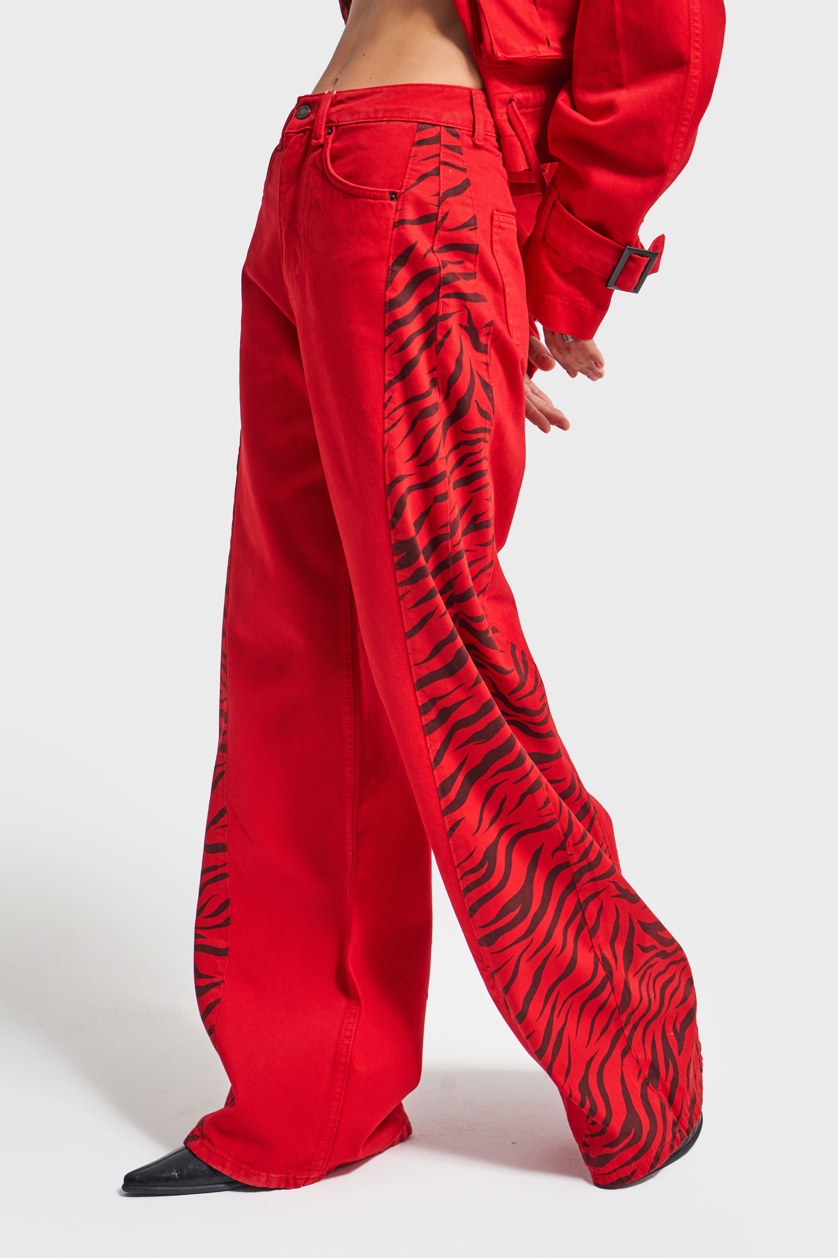 Women's Red Color Palazzo Fit Special Fabric Design Trousers