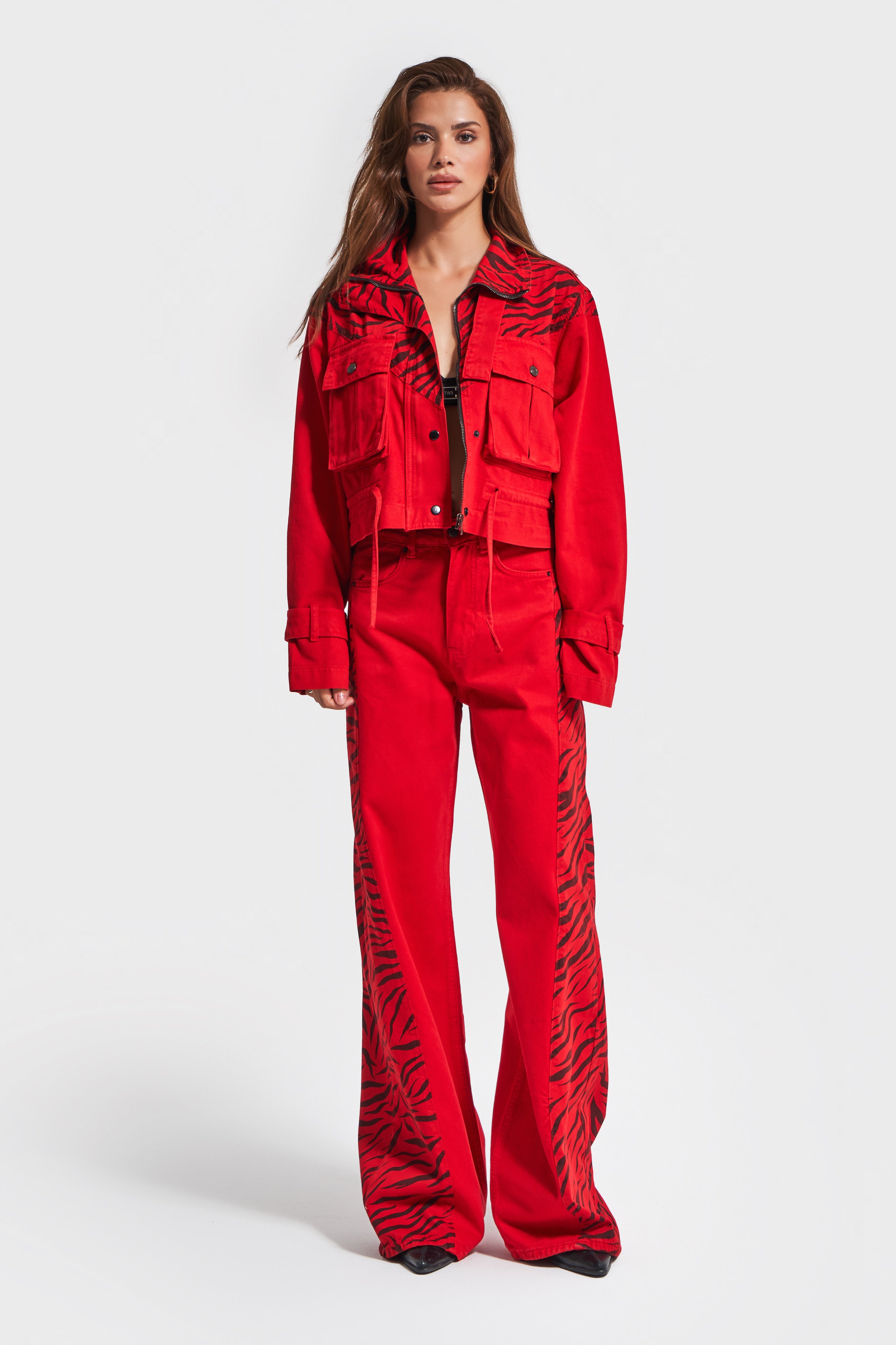 Women's Red Color Palazzo Fit Special Fabric Design Trousers